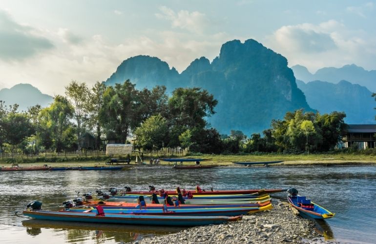 Taking a boat tour in Vang Vieng