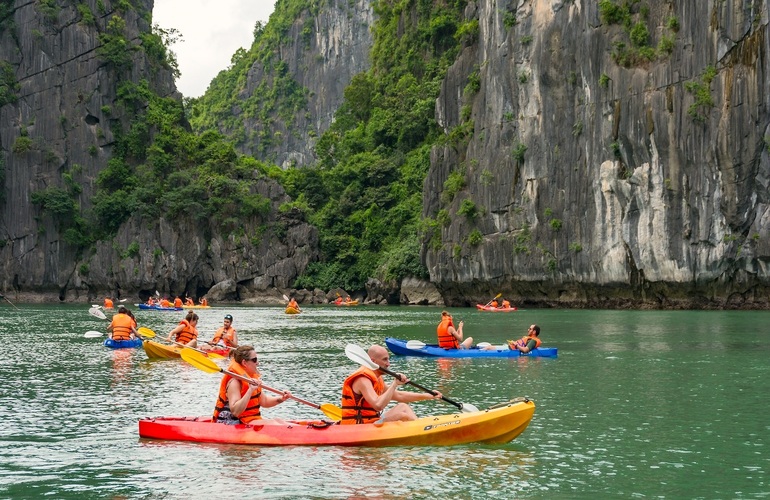 Exciting experience with kayaking to explore Halong Bay