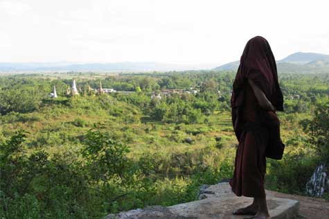 Spend a while in the peaceful village before taking the old stairway to climb a hill nearby Inle Lake, on top of which sits a gigantic Buddha statue