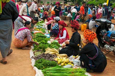 In the morning, pay a visit to the traditional morning market on Inle Lake, which is closed on every full-moon and dark-moon day