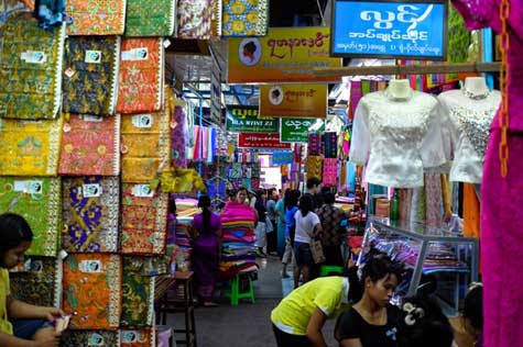 Tourists visit local markets.