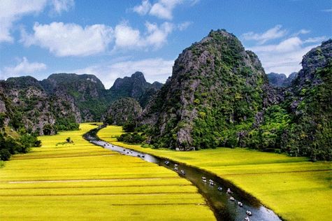 Take boat trip at Trang An Landscape Complex